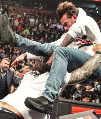 WWE Raw Results (March 23, 2026): Roman Reigns Spears CM Punk Through Commentary Table, Penta Retains Intercontinental Title Roman Reigns Spears CM Punk during intense confrontation